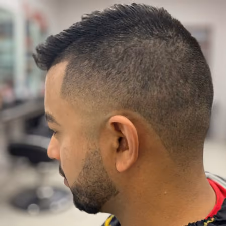 Mid Taper Fade & Short Textured Quiff - Graduated mid taper with textured lifted quiff and neat chin strap beard lineup.